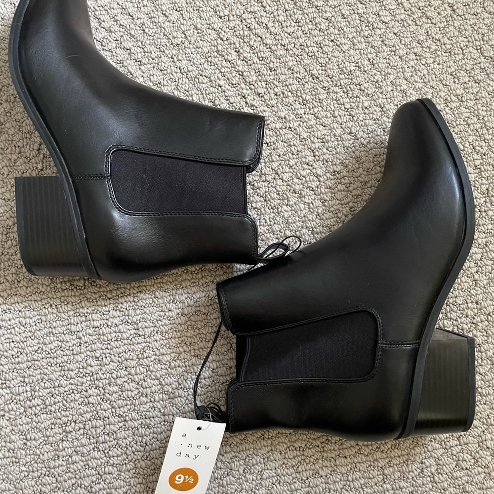 Brand new never worn black booties